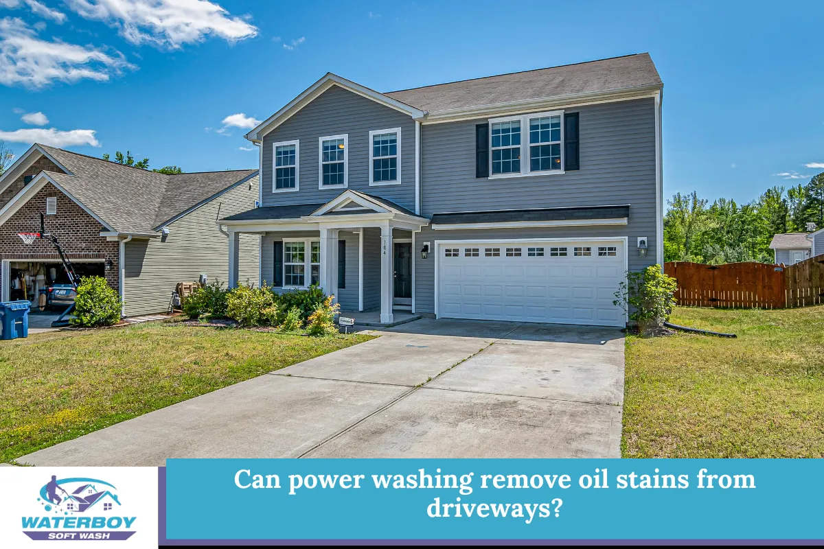 Can power washing remove oil stains from driveways?